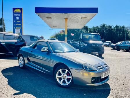 MG